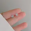 Agulha de Prata Esterlina S925 Zircônia Rosa Furos de Orelha Brincos de Tarraxa Femininos 2025 Novo Nicho Sentido Avançado Brincos Livres para Dormir