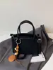 Bolso de mano retro de gamuza para mujer, nuevo estilo 2026, adecuado para el trabajo, bolso tote pequeño, bolso bandolera tipo cubo para ir al trabajo