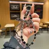 Celebridade da Internet Estéreo de Alta Qualidade Pingente de Corrente para Celular com Laço de Cristal Chaveiro Cordão de Celular com Pérola Corrente para Bolsa