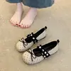 Zapatos Mary Jane retro franceses con lazo tachonado para mujer, nuevos zapatos planos versátiles de primavera 2026, poco profundos, de un solo color