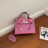 Bolso nuevo Kelly para mujer de gran capacidad, bolso de mano de moda con pañuelo de seda, elegante y versátil para el trabajo, bolso de hombro y cruzado