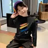 Ropa interior térmica casual de forro polar para niños Otoño e Invierno 2026 Nuevo Estilo Cálida de Manga Larga con Cuello Semialto Camiseta Versátil para Niños