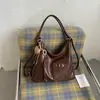 Mochila tote grande de estilo coreano vintage transfronteriza para mujer, diseño simple de nicho, bolso de mano y bandolera casual para el día a día