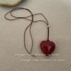 Nuevo collar de suéter versátil con cuerda negra ajustable de amor negro de estilo coreano, accesorios con colgante de corazón rojo
