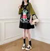 Camiseta de Manga Corta Raglán con Estampado de Dibujos Animados Americanos para Mujer Verano 2025 Marca de Moda Tops Sueltos Moda para Gorditas Reductores de Edad
