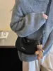 Bolso de mano tipo dumpling de diseño nicho transfronterizo, nuevo bolso de axila casual y moderno para mujer, adecuado para el trabajo y los desplazamientos, bolso de hombro, bolso cruzado, moderno