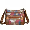 Bolso de mujer multicapa 2026 nuevo modelo bolso pequeño de cuero suave bolso de hombro para mujer bolso cruzado de moda versátil bolso grande para mamá