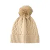 Gorros de punto con pompón al por mayor 2022 nuevo estilo japonés simples versátiles para estudiantes gorros de lana cálidos gorros tipo pullover con forro polar para mujer