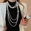 Collar Redondo Multicapa de Perlas y Cuentas Moda Temperamento Cadena para Suéter Elegante Lujo Ligero Sensación de Alta Gama Adorno de Collar Transfronterizo Europeo y Americano