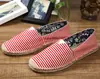 Casal sapatos de lona sapatos de palha sapatos masculinos e femininos sapatos baixos tendência lazer preguiçoso pescador sapatos de linho fabricantes atacado
