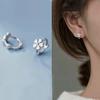 Nuevo estilo flor de margarita fresca hebilla de oreja femenina diseño de nicho temperamento dulce de alta gama aretes mini de moda para combinar con todo