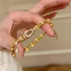 Pulsera Francesa Retro con Hebilla de Herradura Ojo de Gato Incrustada de Diamantes para Mujer, Pulsera Elástica de Estilo Antiguo de Nicho para Mujer