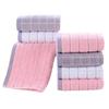 Toalla de lavado facial al por mayor para el hogar de algodón unisex toalla facial de algodón absorbente de pelusa toalla de baño empaque independiente