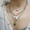 Joyería transfronteriza europea y americana personalidad retro collar de perlas barrocas cadena de clavícula collar de amor de múltiples capas para mujer