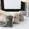 Nuevos calcetines de hombre para primavera y verano 2025 bordado de letras casual algodón color liso calcetines hombre