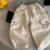 Pantalones Largos para Niños 2026 Otoño Nueva Llegada Niños y Niñas Color Sólido Bolsillo Pantalones Cargo Bebé Cordón Pantalones Jogger Infantiles de Moda