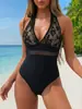 Traje de baño de una pieza de estilo nuevo transfronterizo europeo y americano para el verano 2027, bikini sexy para mujer que adelgaza y oculta el abdomen, traje de baño para vacaciones en la playa