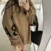 Suéter de Tricô Preto Soltinho e Relaxado Estilo Coreano para Mulheres 2026 Outono e Inverno Suéter Feminino de Manga Longa de Comprimento Médio para Usar por Cima