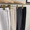 Pantalones cortos británicos para hombre, elegantes leggings rectos ajustados con colgante, pantalones cónicos de nueve puntos estilo coreano