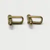 Directo de fábrica hecho a mano DIY pie plano doble agujero gemelos de cobre estilo europeo y americano Dalan Dientes Pie oblicuo Accesorios para Ropa de Puño