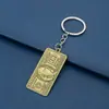 Llavero con colgante de dólar estadounidense, estilo hip hop europeo y americano, con forma de dólar estadounidense, de metal, ideal como regalo personalizado.