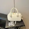 Bolsa de mano de boliche de moda para mujer Primavera 2026, Bolsa tipo almohada coreana con sensación de alta gama, Bolso de hombro cruzado
