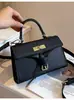 Bolsa de mujer de venta caliente transfronteriza otoño 2026 nuevo súper popular nicho platino bolso Kelly versátil bolso de hombro y bandolera