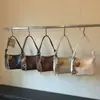 Bolso de hombro simple y versátil, nuevo bolso cruzado de moda 2026 para el día a día, gran capacidad, color liso, bolso de hombro de lujo ligero para debajo del brazo