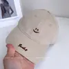 Gorra de Béisbol de Color Sólido con Parte Superior Suave y Cara Sonriente Simple Estilo Primavera para Hombres y Mujeres, Estilo Pareja, Sombrero Versátil de Nicho para Protección Solar