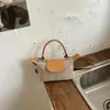 Bolso Pequeño Tejido Retro para Mujer 2026 Nuevo Diseño de Nicho Bolso de Hombro Cruzado Bolso de Mano de Alta Gama para el Trabajo