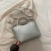 2026 Elegante Bolso de Mano Versátil de Gran Capacidad para Mujer Moda de Nicho Nuevo Bolso Cruzado para Mujer Verano Tejido con Acabado de Alta Gama