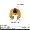 Anillo de acero inoxidable bañado en oro estilo europeo y americano con piedra ojo de tigre, una pieza de joyería lujosa y de alta gama con piedra ojo de tigre natural y acero de titanio, diseñado para ser duradero y resistente a la decoloración