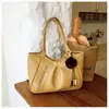 Elegante bolsa de ombro feminina 2026 novo modelo, bolsa tote de grande capacidade para o dia a dia, bolsa de mão versátil e da moda, bolsa simples de ombro