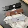 Cinturón portátil más vendido transfronterizo con cierre de velcro ajustable, hebilla elástica unisex para la cintura