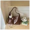 Bolso tote vintage de nicho transfronterizo para mujer, mochila de hombro cruzado versátil y moderna de gran capacidad, bolso de mano