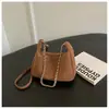 Bolso bandolera casual de diseño de nicho de gran capacidad transfronterizo nuevo 2026 para mujer, bolso de hombro tipo tote con cadena para ir al trabajo