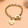 Pulsera de Acero Titanio con Hebilla OT de Amor a la Moda Grabado con Letras en Forma de Corazón Acero Inoxidable Pulsera Versátil Diseño Nicho Joyería para Mujer