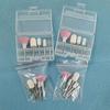 Set de cinco piezas de cabezales de pulido de uñas de esmeril de acero de tungsteno, en caja, herramienta de pulido de la superficie de la uña, mini amoladora eléctrica