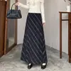 Falda de mujer con estampado de lunares y rayas estilo retro, nueva falda larga adelgazante de cintura alta en negro para otoño