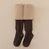 Medias de invierno para niñas, superventas transfronterizas, color sólido de algodón, engrosadas y cálidas, raya vertical, alta elasticidad, pantalones ajustados para niños pequeños y niños pequeños