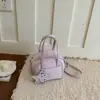 Bolsa de Mão com Textura Retro de Nicho Shuai Mi Home Bolsa Tote Pequena para Mulheres Novo Modelo 2026 Bolsa de Ombro Simples Bolsa Transversal Tendência