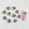 Novos acessórios de nail art de pêssego com fundo transparente bicolor, celebridade da internet, borda dourada, coração de cor mista transparente, acessórios para capa de celular DIY