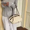 Tendencia coreana bolso versátil de nicho de un solo hombro bolso de mano diario para mujer nueva moda 2026 simple de verano tipo tote diario atmosférico