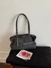 Bolso de hombro cruzado de diseño nicho coreano para mujer, nuevo bolso de mano de moda casual a rayas para la ciudad, de gran capacidad