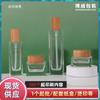 Nuevo frasco de emulsión de vidrio redondo recto con tapa de madera maciza, frasco para rellenar transparente, material de embalaje para rellenar cosméticos, frasco para crema de superficie
