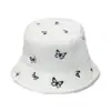 Sombrero de cuenca nuevo transfronterizo para mujer otoño e invierno europeo y americano casual sombrero cálido bordado de mariposa de lana de cordero sombrero de pescador comercio exterior para mujer