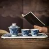 Juego de Té Xianglong Azul y Blanco Cerámica Retro China Juego de Burbuja Seca Tapa Flotante Taza de Té Bandeja de Té Souvenir de Negocios