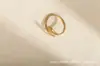 Anel Personalizado Europeu e Americano Cruzado em Aço Titânio com Formato de Cobra Que Não Desbota Anel em Aço Inoxidável Banhado a Ouro a Vácuo 18K Acessórios Hip-Hop