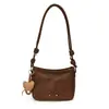 Bolso versátil para el día a día de moda transfronteriza para mujer, bolso de hombro cruzado de moda con textura de cuero encerado, bolso de axila de alta apariencia