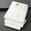 Suministro Directo de Fábrica Pantalones de Lujo para Hombre de Diseñador Elásticos Negros y Blancos Cortos de Pierna Recta Tejido Anti-Decoloración Nueva Triple Protección